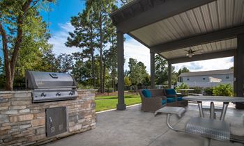 Picnic pavilion with charcoal grills and string lights
